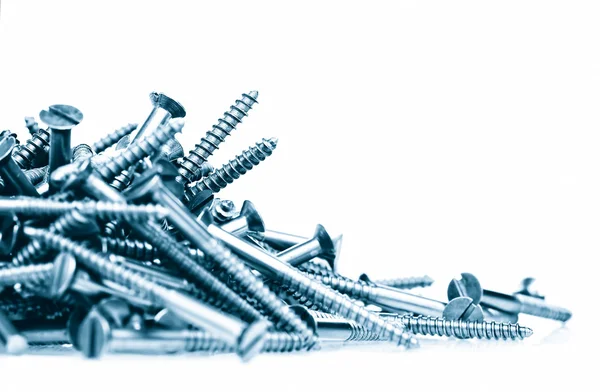 Metallic screws isolated on white with space for text — Stock Photo, Image