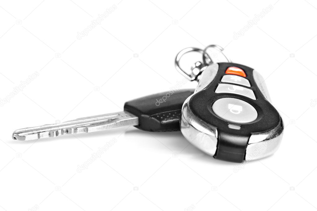 Car keys and remote alarm controller isolated onwhite