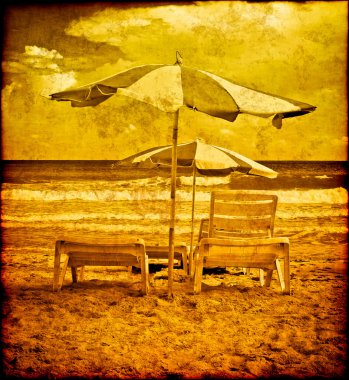 Vintage beach postcard with chairs and umbrellas clipart