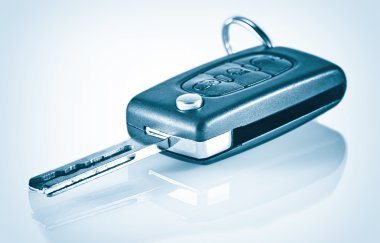 Car keys on a blue background clipart