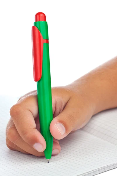 Escritura a mano de niño con una pluma colorida — Foto de Stock