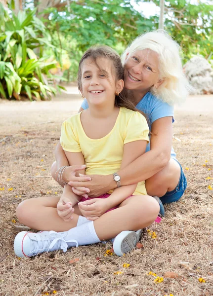 Latin girl with her grandmother in a park — Stock Photo, Image