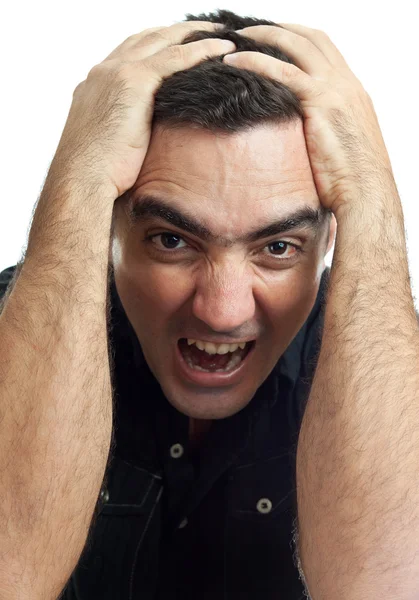 Homem hispânico violento gritando com um rosto irritado ou desesperado — Fotografia de Stock