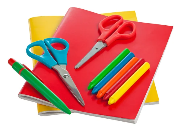 Cadernos coloridos e outros materiais escolares isolados em branco — Fotografia de Stock