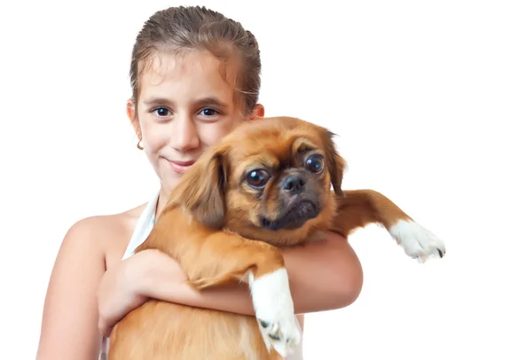 Schöne hispanische Mädchen mit ihrem pekingese Hund isoliert auf weiß — Stockfoto