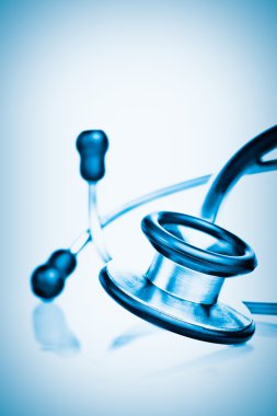 Stethoscope on a blue background clipart