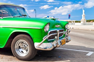 Classic 1955 Chevrolet parked in Havana, Cuba clipart