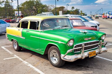 Classic 1955 Chevrolet parked in Havana, Cuba clipart