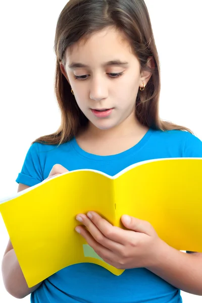 Dziewczyna Łacińskiej pisania na na białym tle notebook — Zdjęcie stockowe