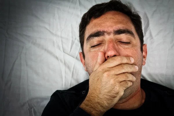 Grunge portrait of a very sick hispanic man — Stock Photo, Image