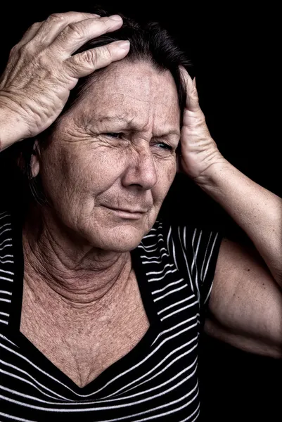Grunge portrait of a stressed old woman — Stock Photo, Image