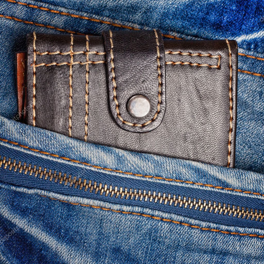 Jeans with a leather wallet on its pocket — Stock Photo © kmiragaya