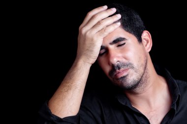 Hispanic man worried or having a headache clipart