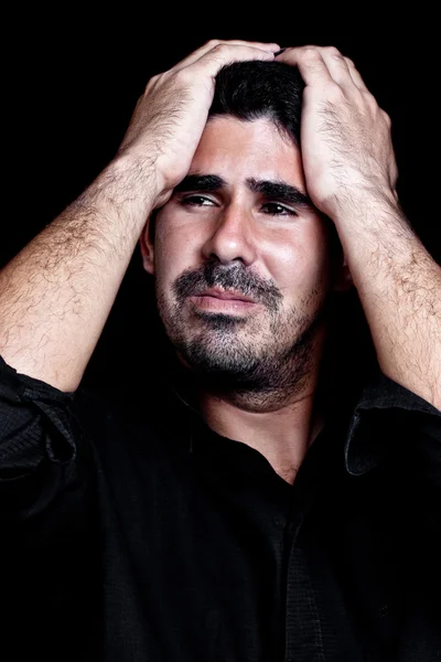 Young hispanic man suffering a headache — Stock Photo, Image