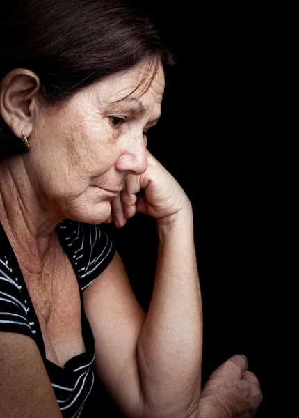 Triste e preocupado velha mulher — Fotografia de Stock