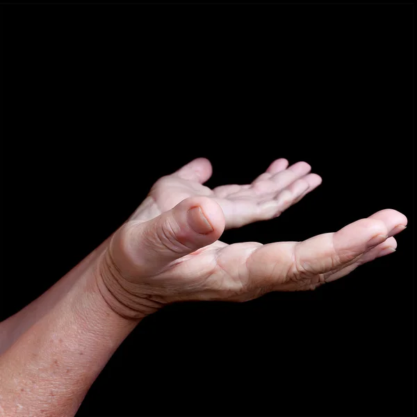 Δύο χέρια που απομονώνονται σε μαύρο — Φωτογραφία Αρχείου