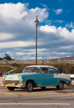 Classic american car parked in Old Havana clipart