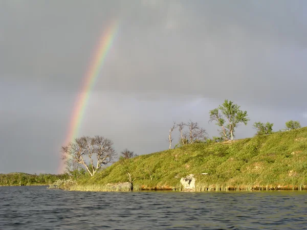 Rainbow and lake — Stock Photo, Image