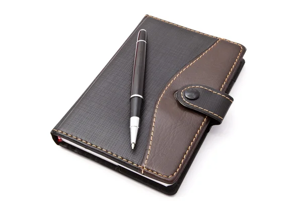 Notebook and Pen Stock Image