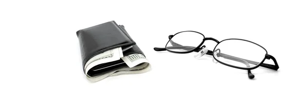 Készpénzfizetési pénztárca és szemüveg — Stock Fotó