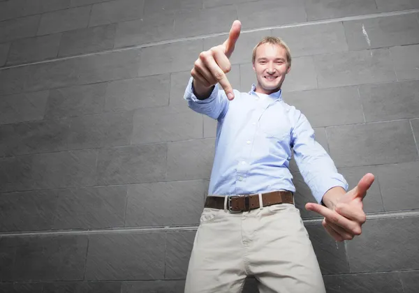 Homem mostrando um gesto obsceno — Fotografia de Stock
