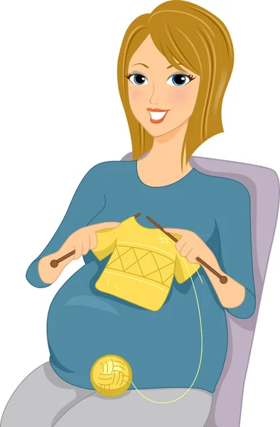 Беременная женщина вязала — стоковое фото