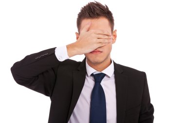 Business man making the see no evil gesture clipart