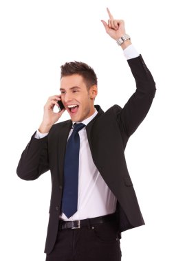 Winning business man on the phone clipart
