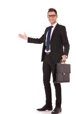 Business man with a briefcase welcoming clipart