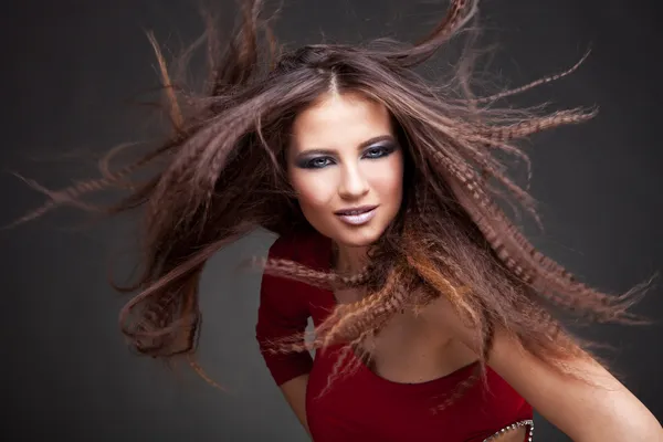 Beautiful woman with magnificent hair blown — Stock Photo, Image