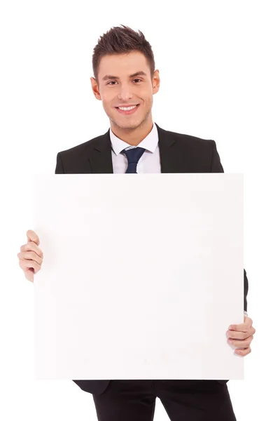 Hombre de negocios con tablero en blanco — Foto de Stock