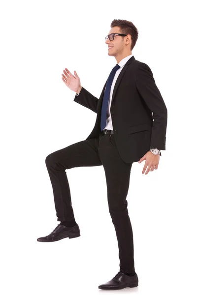 Business man stepping up — Stock Photo, Image