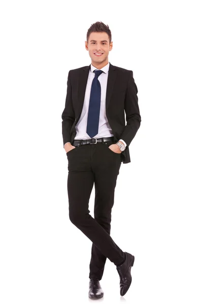 Business man standing with hands in pocket — Stock Photo, Image