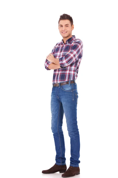 Trendy man standing with arms crossed — Stock Photo, Image