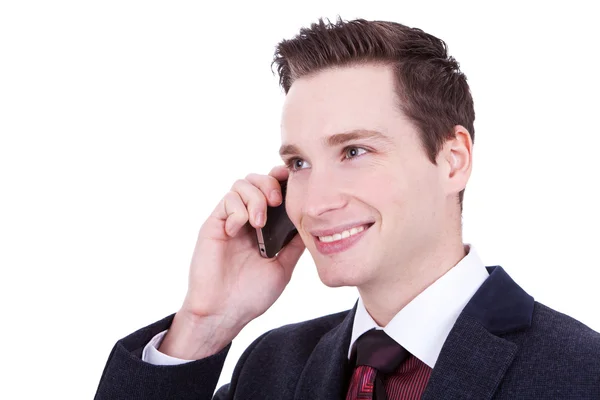 Obchodní muž mluví přes mobil — Stock fotografie