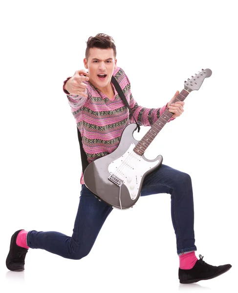 Excited rock star poiting to the camera — Stock Photo, Image