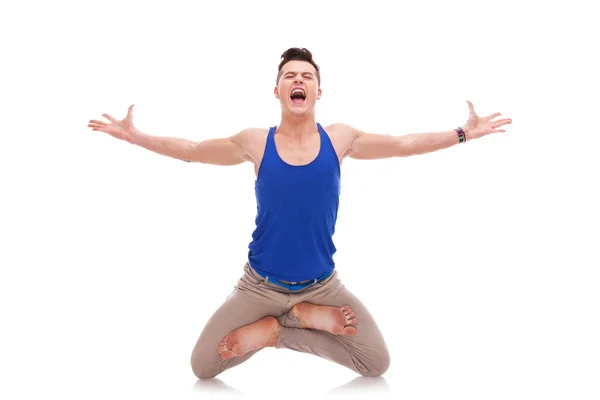 Screaming man in a zen position — Stock Photo, Image