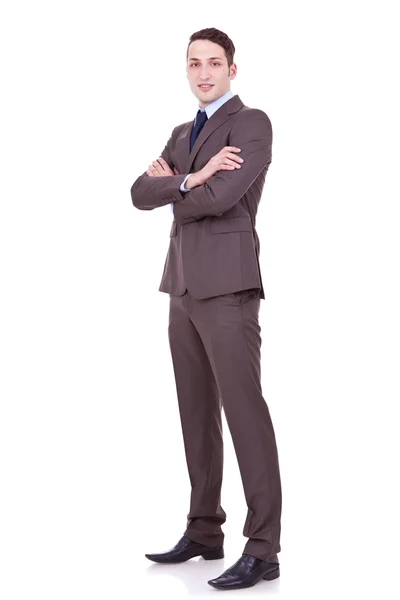 Empresário com braços cruzados no backgroun branco — Fotografia de Stock