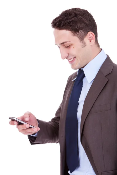 Glücklicher Geschäftsmann beim Lesen einer SMS — Stockfoto