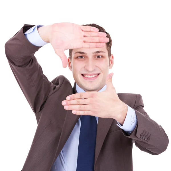 Executivo fazendo moldura com as mãos — Fotografia de Stock