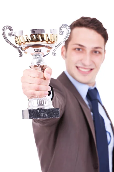 Hombre de negocios entregando un trofeo —  Fotos de Stock