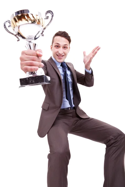 Vzrušení mladých obchodní muž vyhrál pěkná trofej — Stock fotografie