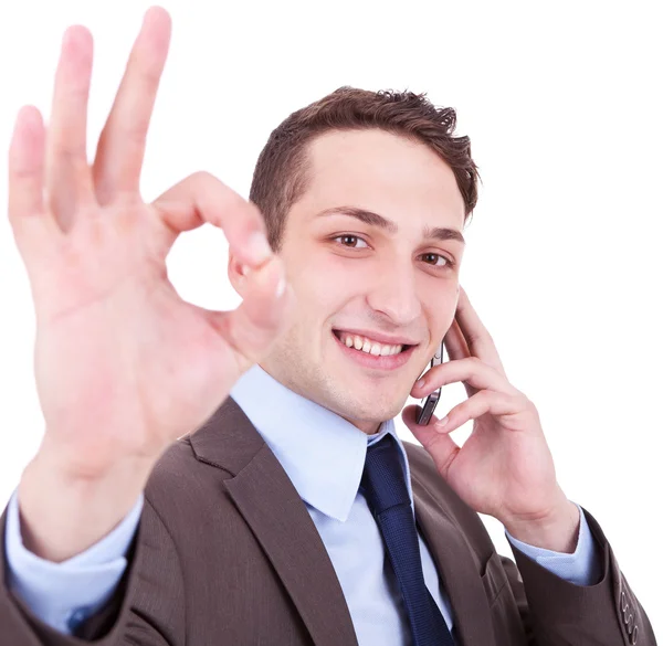 Approving the good news on the phone Royalty Free Stock Photos