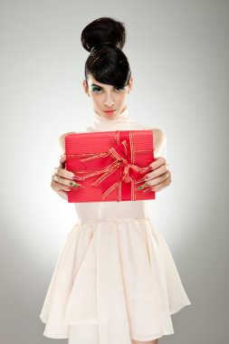 Young woman holding gift clipart