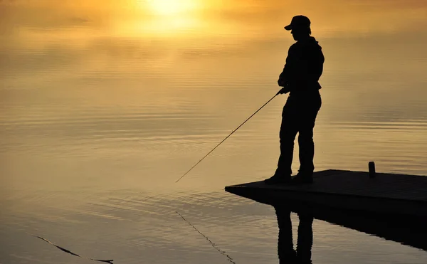 Fishing in sunset — Stock Photo, Image