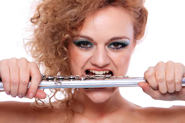 Retrato de uma mulher tocando flauta — Fotografia de Stock