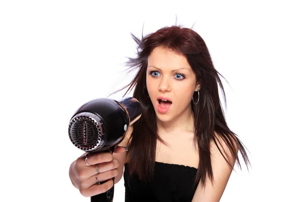 Mujer con peinado de moda sosteniendo secador de pelo —  Fotos de Stock