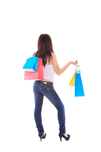 Femme avec des sacs à provisions colorés — Photo
