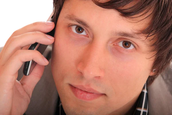 携帯電話上の若いビジネスマン — ストック写真