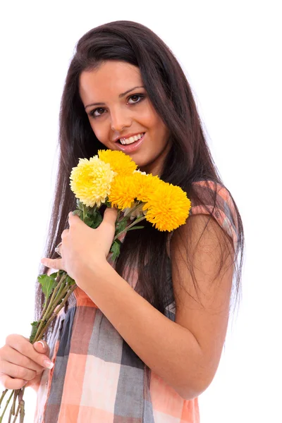 Bruneta s květinou — Stock fotografie